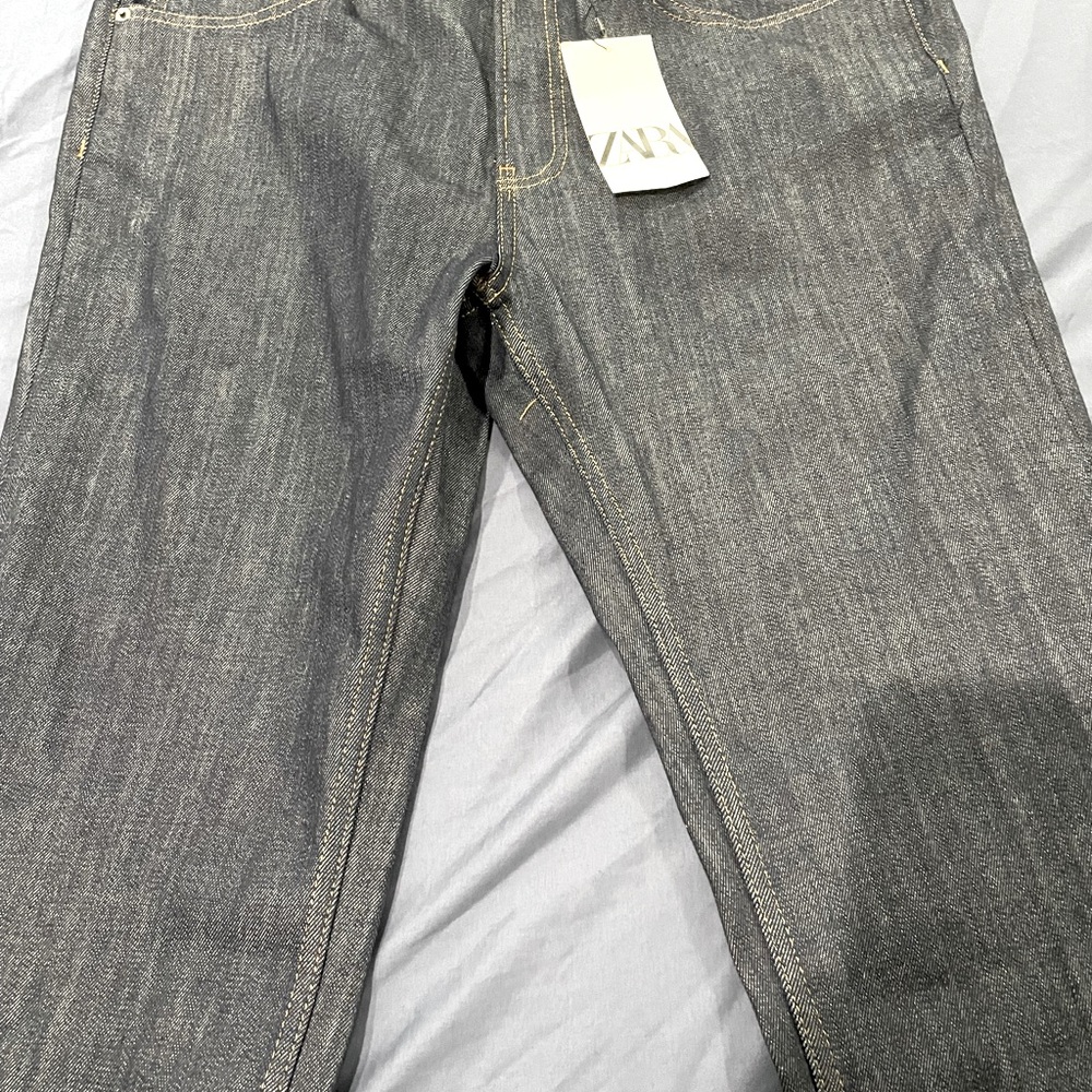 Ladies dark blue denim jeans.